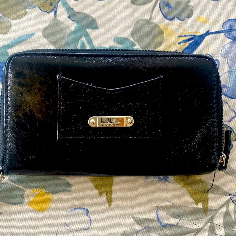 Nicole Miller black purse, 8 x 4 new tags all zip is work preowned